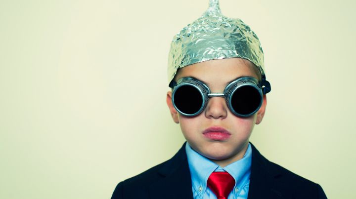 Child wearing a tinfoil hat