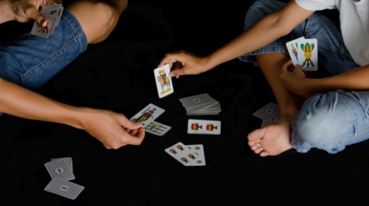 People playing cards during an emergency power outage