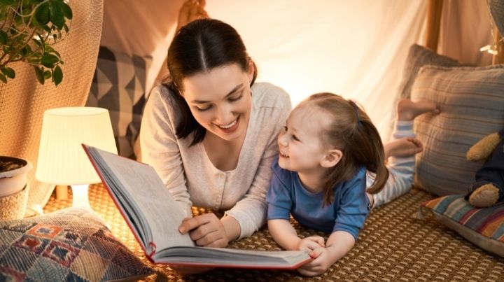 Mom and daughter reading a book