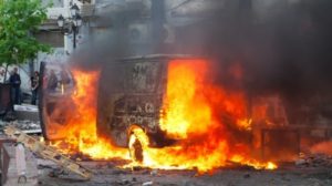 van burning in civil unrest