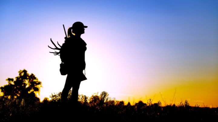 Woman Hunting near sunset