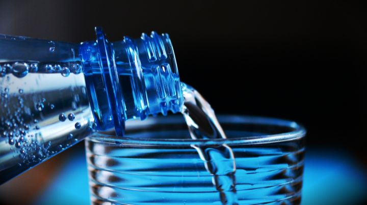 Pouring water into glass