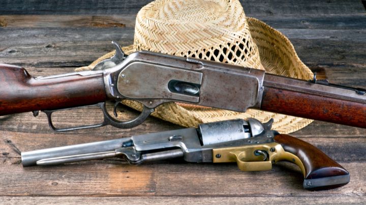 Rifle, Pistol, and cowboy hat