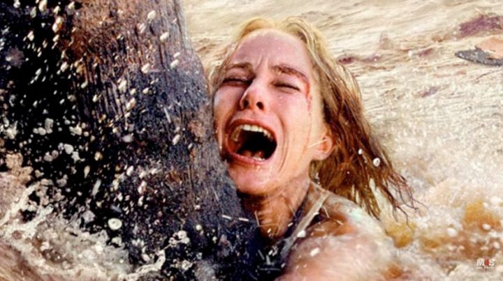 Woman in tsunami flood waters