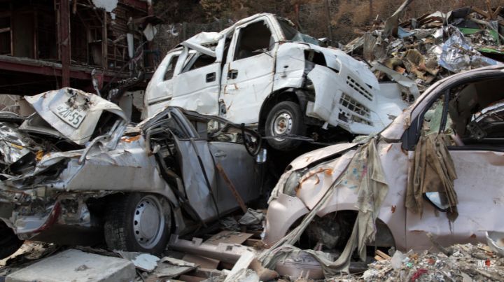 Cars piled on top of one another from a tsunami