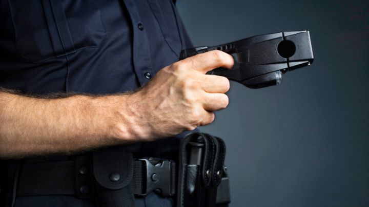 Police officer holding a stun-gun