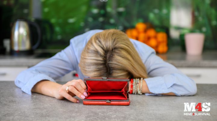 Depressed woman with empty wallet