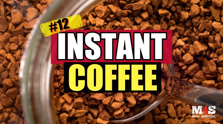 A spoon lifting instant coffee granules.