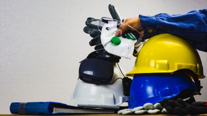 Personal Protective Equipment in a pile on a table