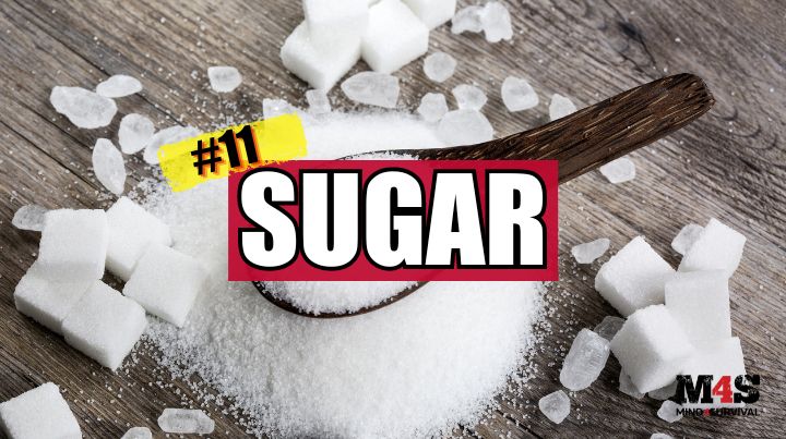 A pile of sugar surrounded by sugar cubes. 