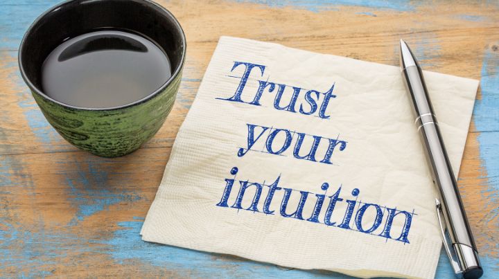 A napkin with the words "Trust Your Intuition" 