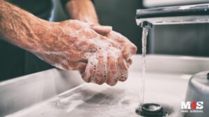 A Surgeon washing his hands