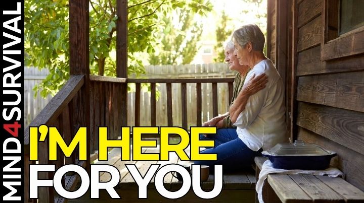 Friend comforting a grieving friend on a rustic porch with coffee mugs and a casserole dish